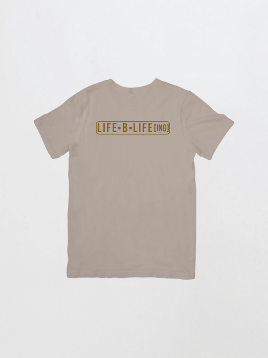 Beige t-shirt with 'LIFE B LIFE LING' text on a light gray background